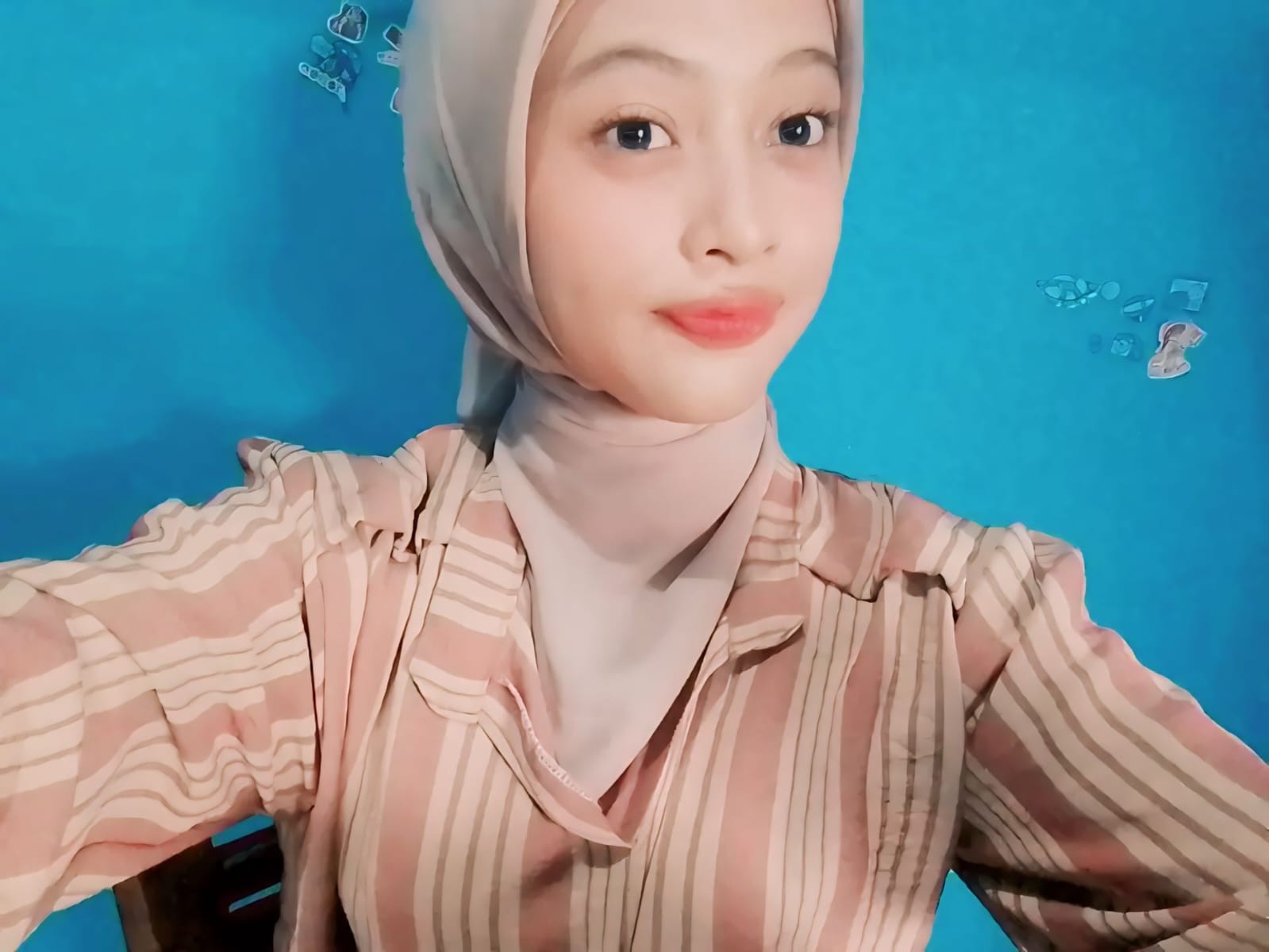 A person sitting at a desk in front of a computer